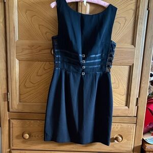 Chic Black Sleeveless Dress with Buckle Accents